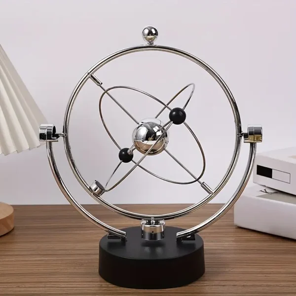 Dispositivo de movimiento perpetuo celestial, para decorar oficinas, escritorios o casas. Un móvil potenciado por imanes que girará por siempre.